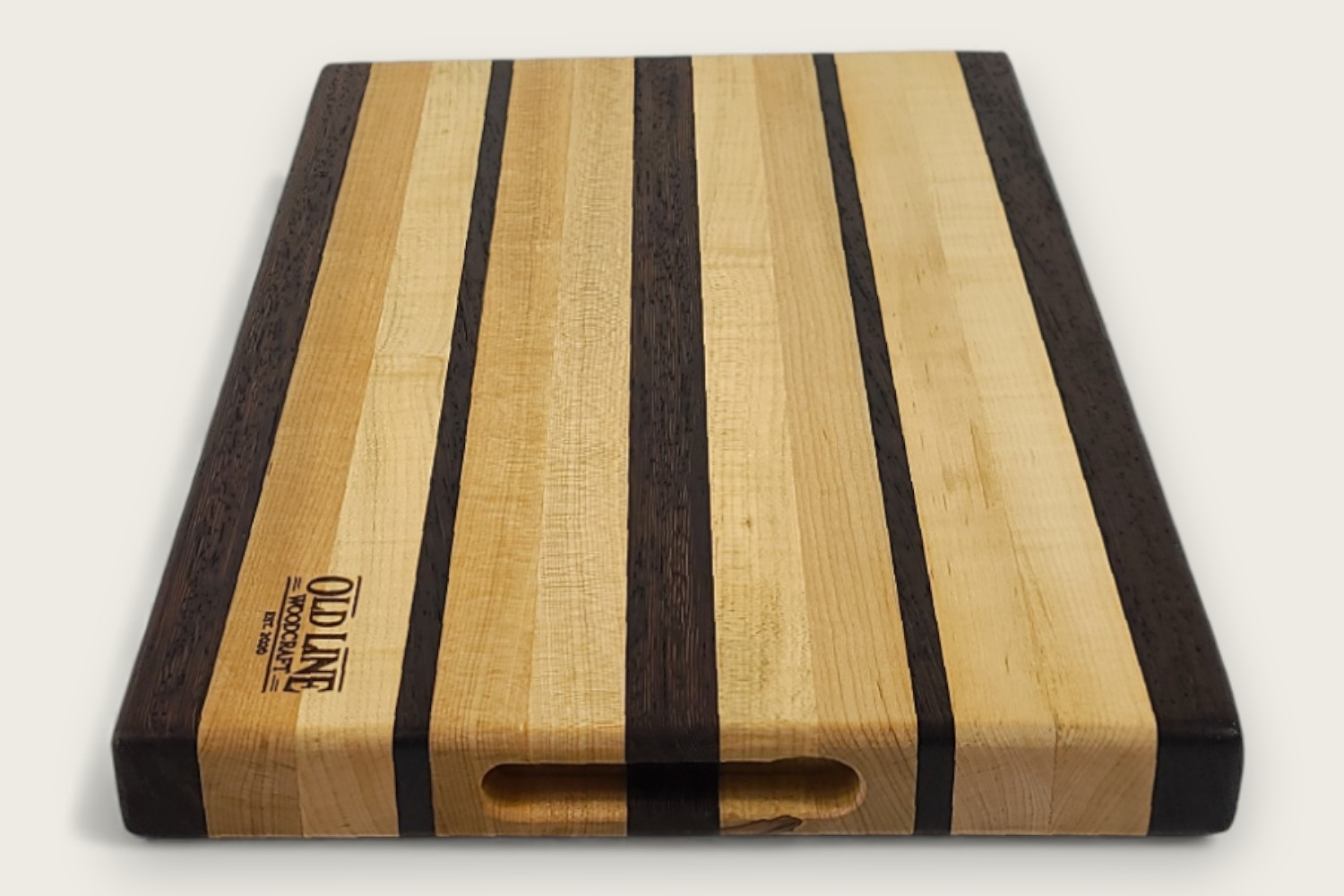 Maple & Wenge Butcher Block (#105) with light maple edge grain, dark wenge accents, and a rectangular shape.